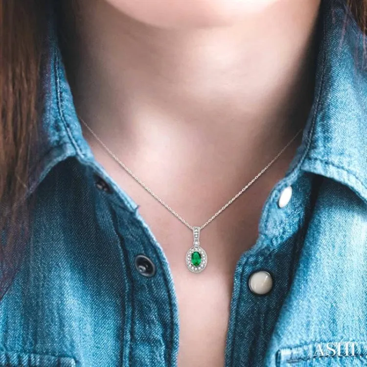 6x4 MM Oval Cut Emerald and 1/8 Ctw Round Cut Diamond Pendant in 14K White Gold with Chain