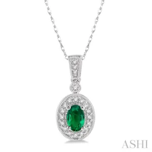 6x4mm Oval Cut Emerald and 1/8 Ctw Round Cut Diamond Pendant in 14K White Gold with Chain