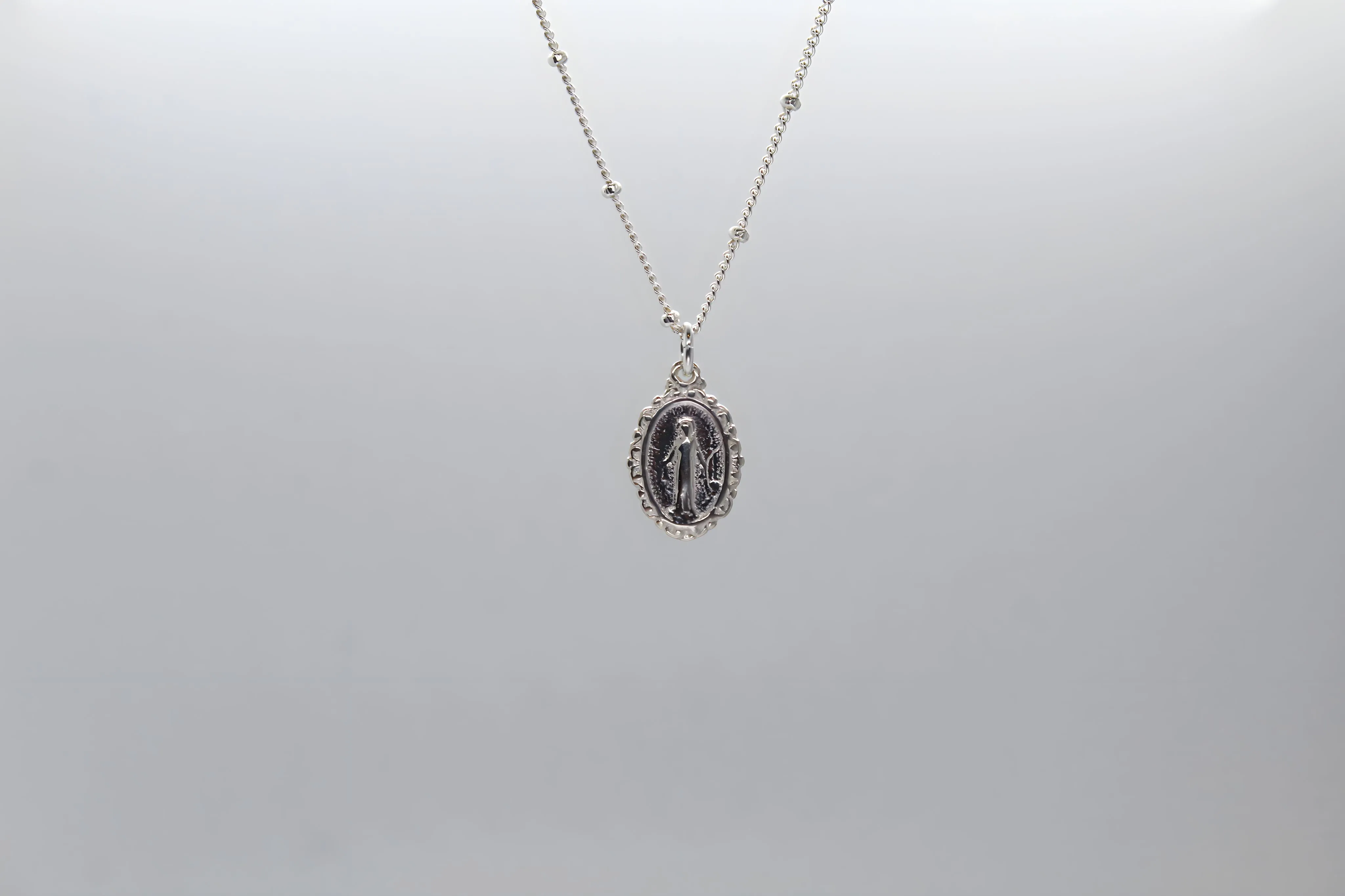 Intricate Miraculous medal necklace-Silver